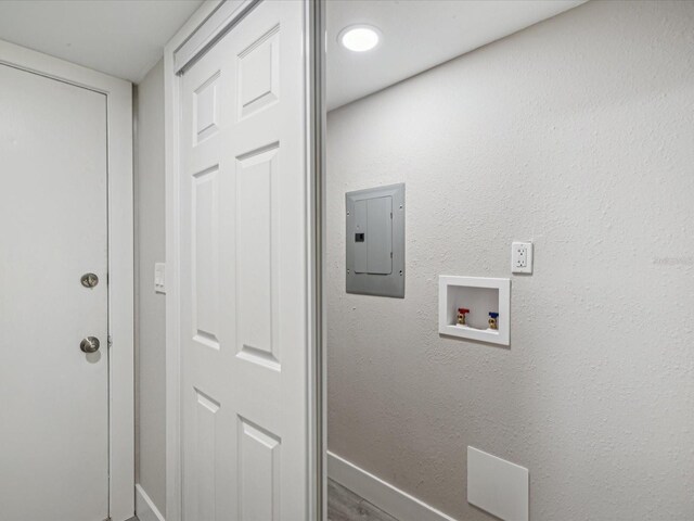 laundry room with washer hookup and electric panel