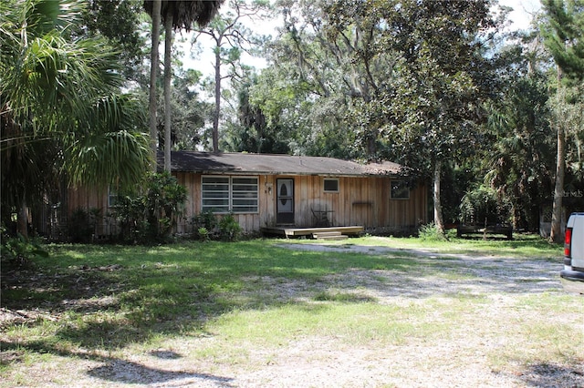 view of front of home with a front lawn