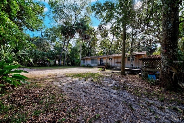 view of yard with a deck