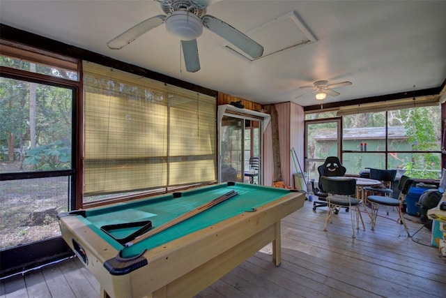 playroom with a wealth of natural light, ceiling fan, hardwood / wood-style flooring, and billiards