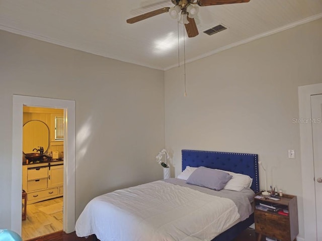 bedroom featuring wood-type flooring, ornamental molding, and ceiling fan