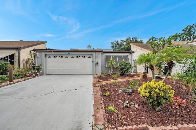 single story home featuring a garage