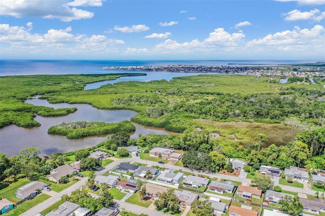 3849 Claremont Dr, New Port Richey, FL 34652 - aerial view of property's location with a large body of water and nearby suburban area