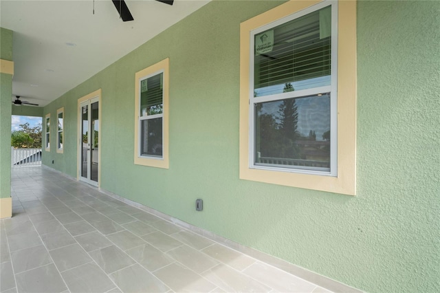 view of patio / terrace featuring ceiling fan