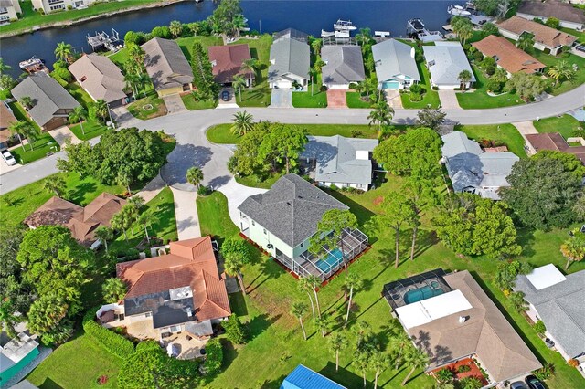 bird's eye view with a water view