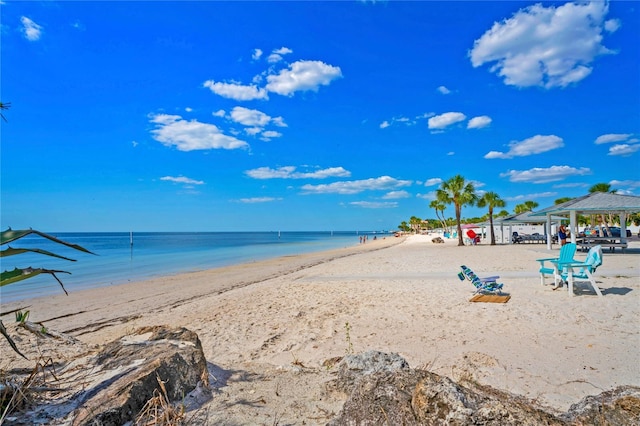 water view with a beach view and a gazebo