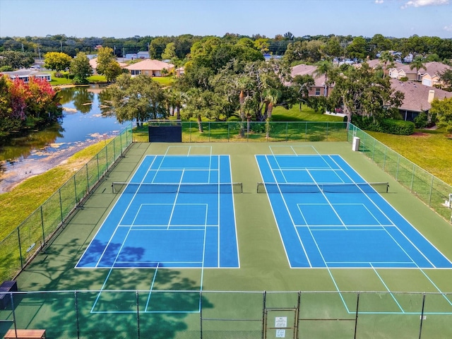 view of sport court featuring a water view