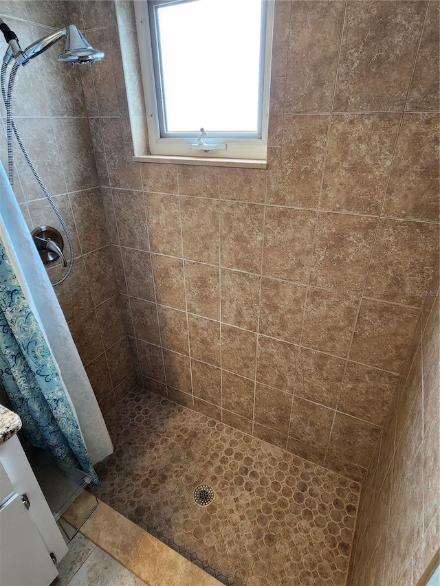 bathroom featuring vanity and a shower with curtain