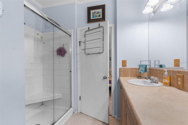 bathroom with vanity, a shower with shower door, and tile patterned floors