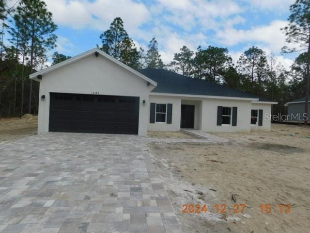 view of front of home featuring a garage