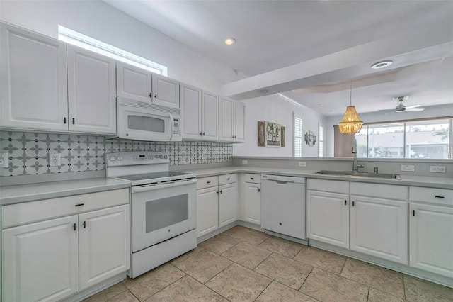 kitchen with white cabinets, backsplash, white appliances, ceiling fan, and decorative light fixtures