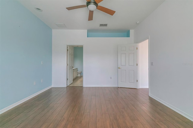 unfurnished room featuring ceiling fan and light hardwood / wood-style flooring