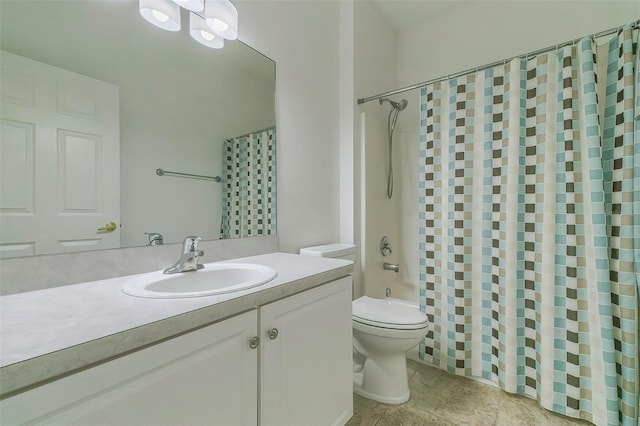 full bathroom with vanity, toilet, and shower / bath combo