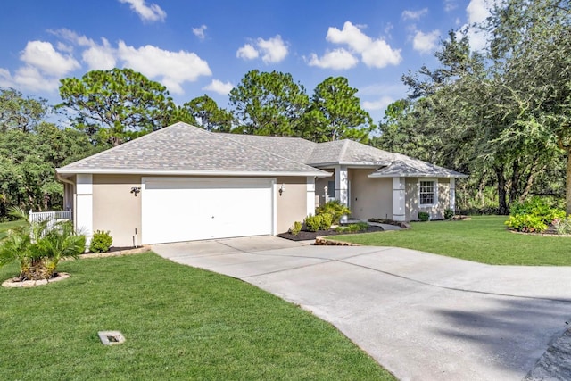 ranch-style home with an attached garage, concrete driveway, roof with shingles, stucco siding, and a front yard