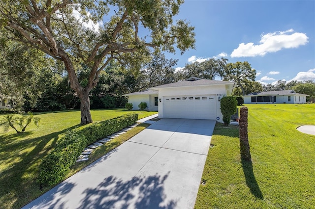 ranch-style house with a front yard and a garage