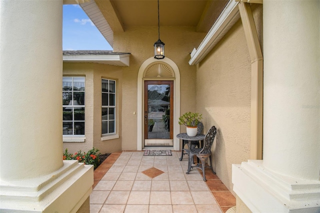 doorway to property featuring a patio