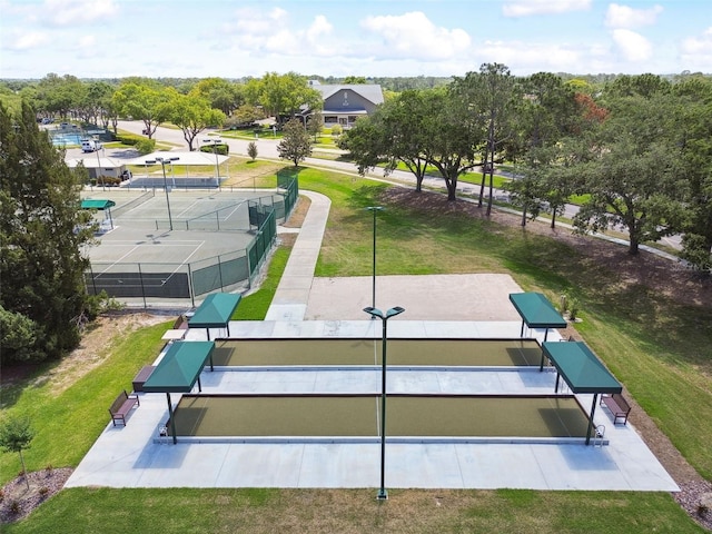 surrounding community featuring tennis court