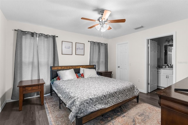 bedroom featuring a textured ceiling, hardwood / wood-style floors, ceiling fan, and ensuite bathroom