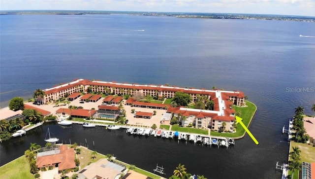 birds eye view of property featuring a water view