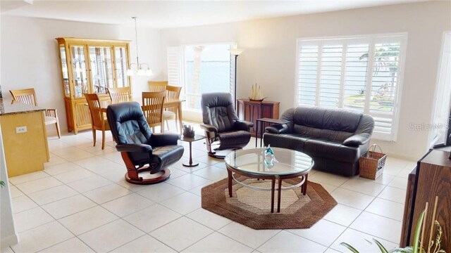 tiled living room featuring plenty of natural light