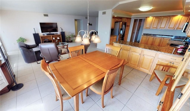 dining room featuring light tile patterned floors