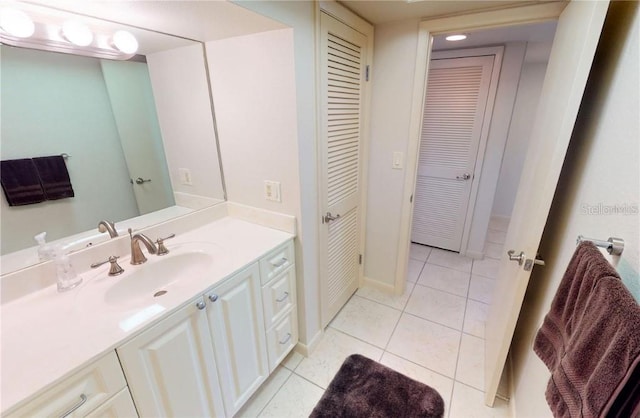 bathroom featuring vanity and tile patterned flooring