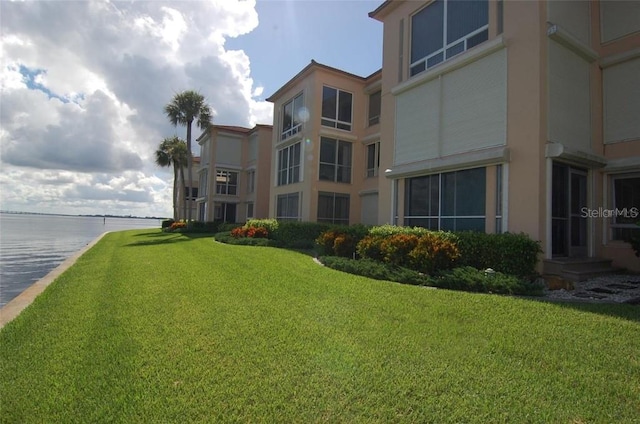 view of property with a water view