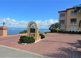 view of home's community with a water view