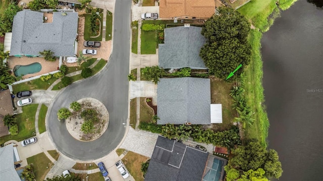 drone / aerial view with a water view