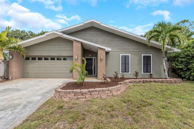 ranch-style house with a garage and a front lawn