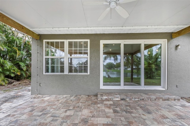 view of patio with ceiling fan