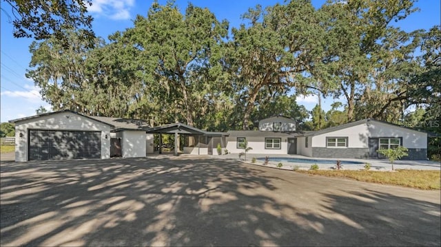 single story home with a garage