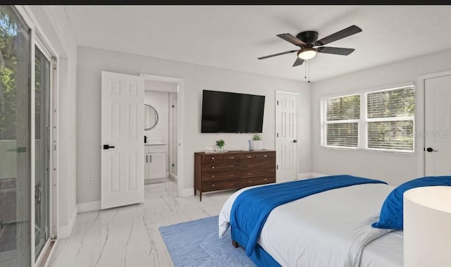 bedroom with ceiling fan and ensuite bathroom