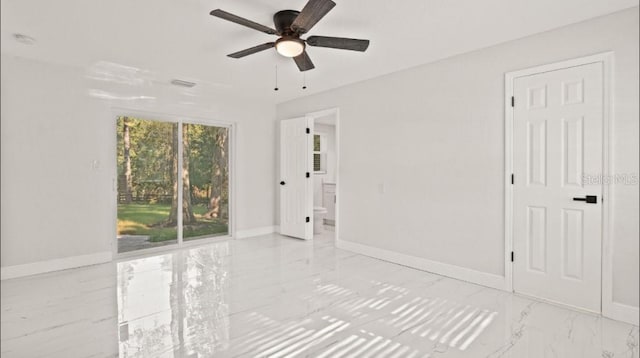 unfurnished room featuring ceiling fan