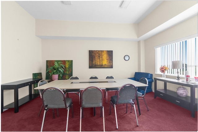 view of carpeted dining room