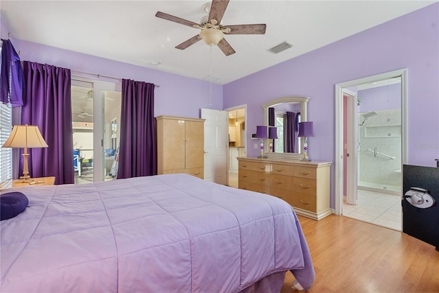 bedroom with access to outside, light hardwood / wood-style flooring, ensuite bath, and ceiling fan