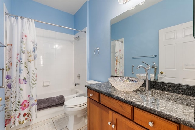 full bathroom featuring shower / tub combo, vanity, tile patterned flooring, and toilet