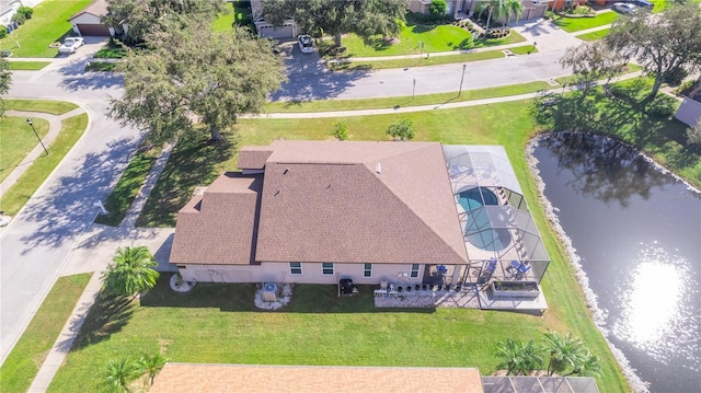 bird's eye view with a water view