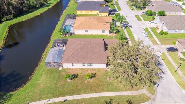 aerial view with a residential view and a water view