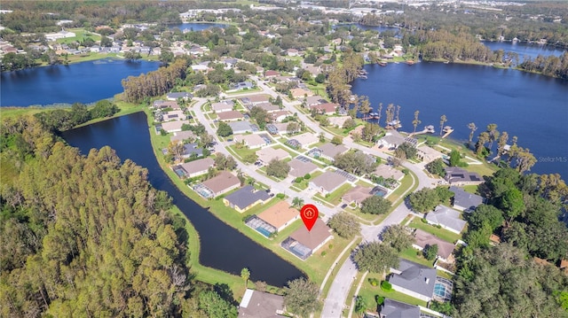 aerial view with a residential view and a water view