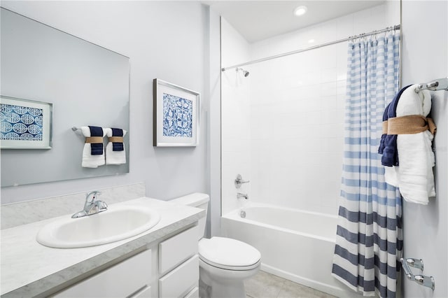 full bathroom with shower / tub combo, vanity, toilet, and tile patterned floors