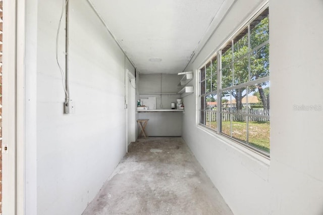 hallway featuring concrete floors