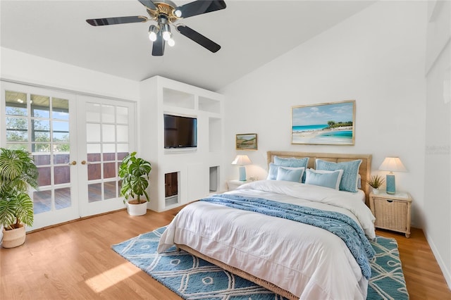 bedroom featuring french doors, ceiling fan, high vaulted ceiling, and hardwood / wood-style floors