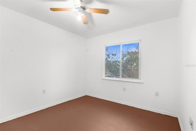 10221 Elgin Blvd, Spring Hill, FL 34608 - unfurnished room with a ceiling fan and dark carpet