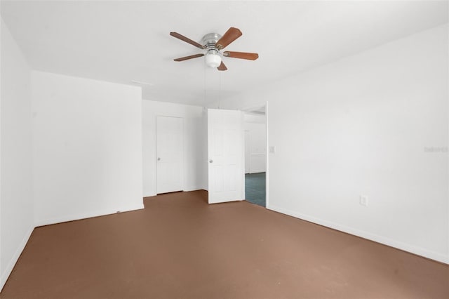 10221 Elgin Blvd, Spring Hill, FL 34608 - spare room featuring ceiling fan and finished concrete flooring