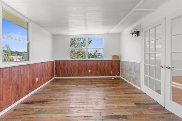 10221 Elgin Blvd, Spring Hill, FL 34608 - unfurnished sunroom featuring french doors and a wall mounted AC