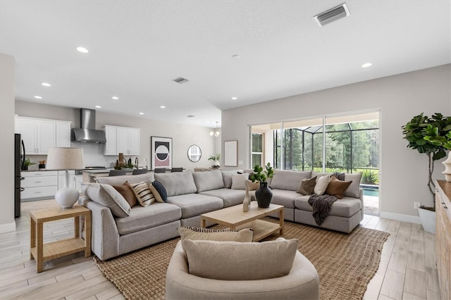 living room with light hardwood / wood-style flooring