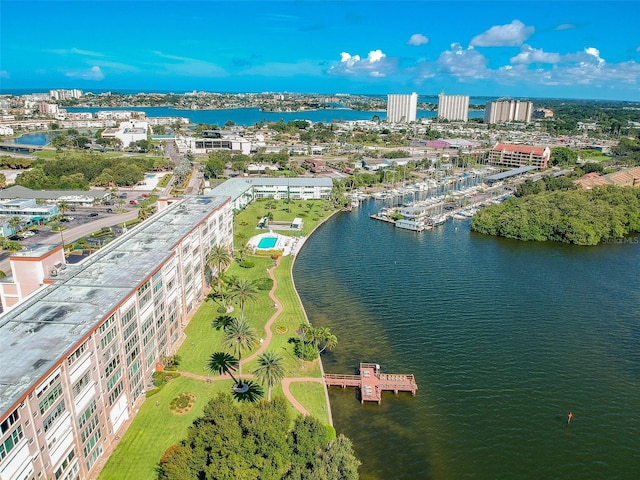 birds eye view of property with a water view