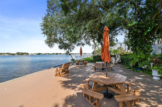 view of patio featuring a water view