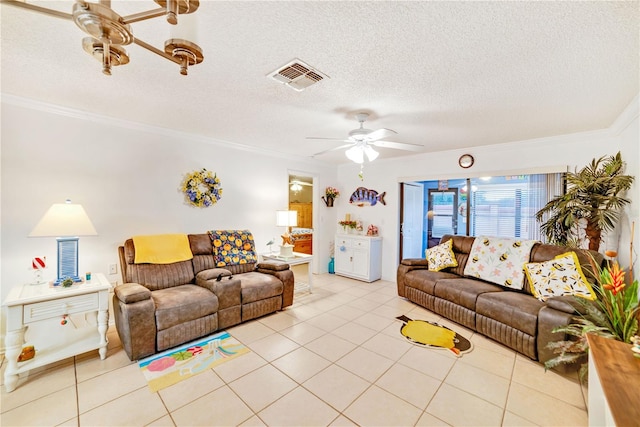 living room with crown molding, light tile patterned floors, a textured ceiling, and ceiling fan